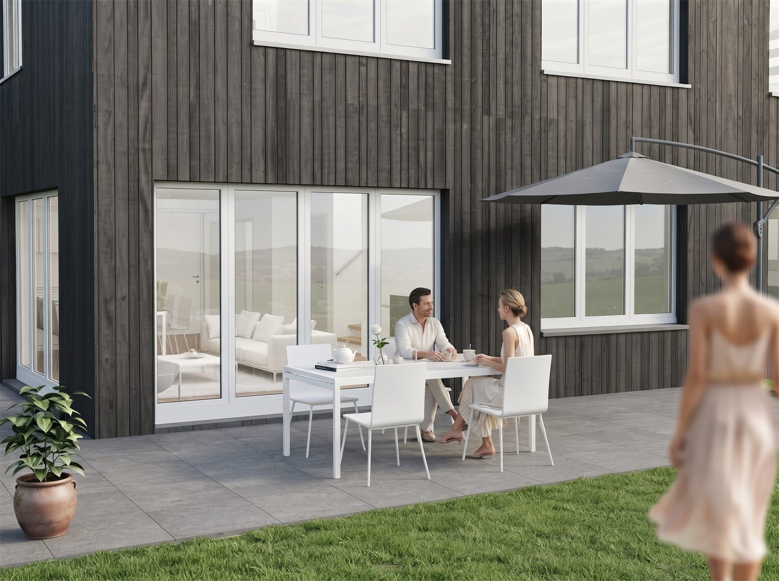Aussenbereich mit Sitzplatz und Holzfassade